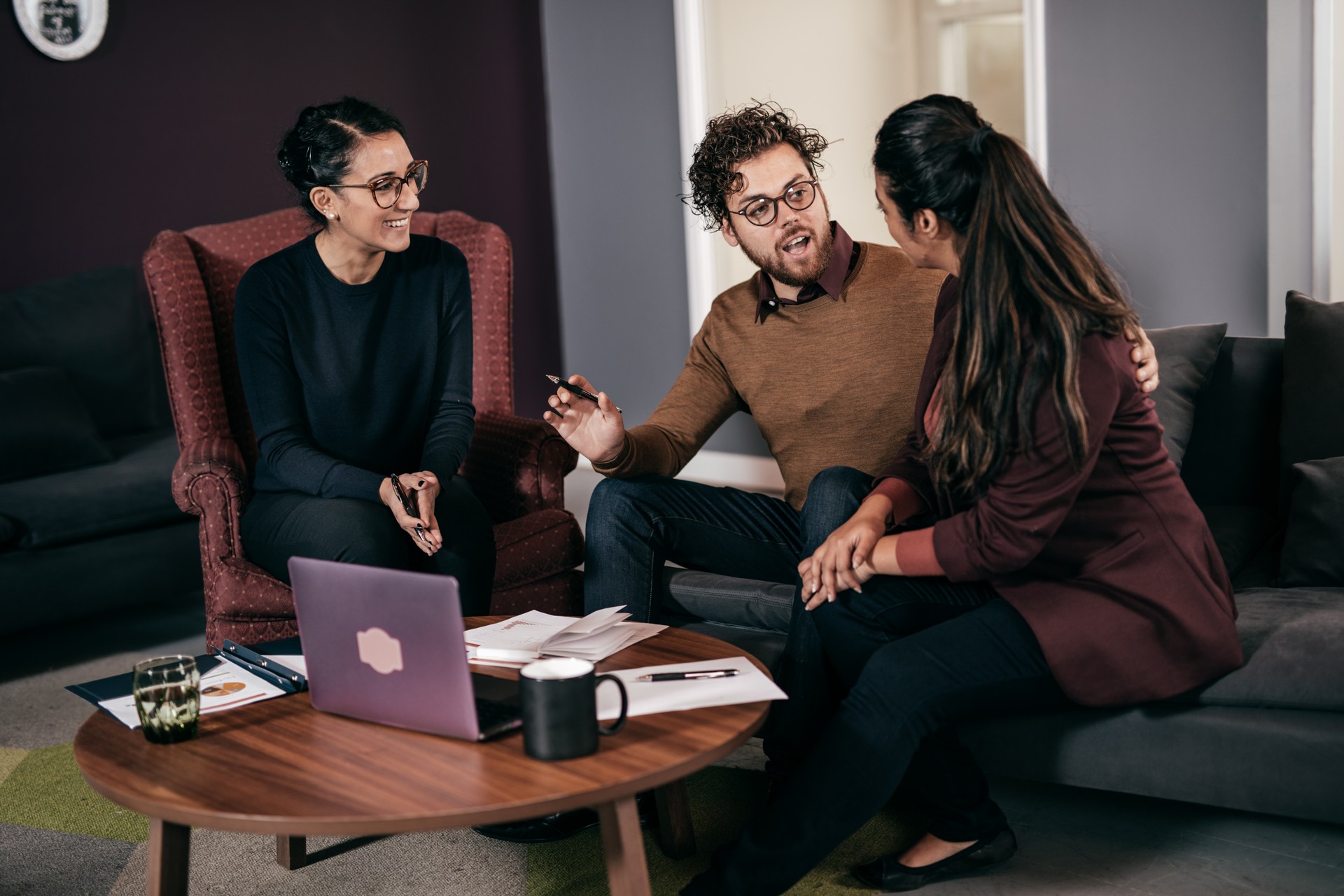 Couple and mortgage broker in the living room